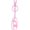 oval d charm Oval D charm/nyckelring i metall och harts
