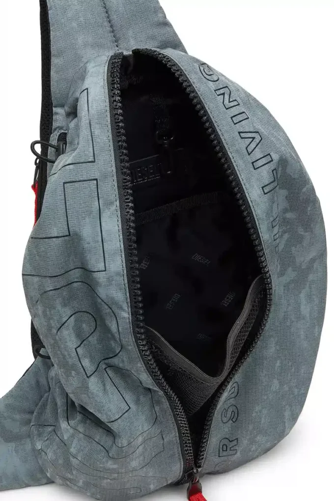 zip-d sling bag x Zip-D Ryggsäck med justerbar axelrem zip-d sling bag x Zip-D Ryggsäck med justerbar axelrem