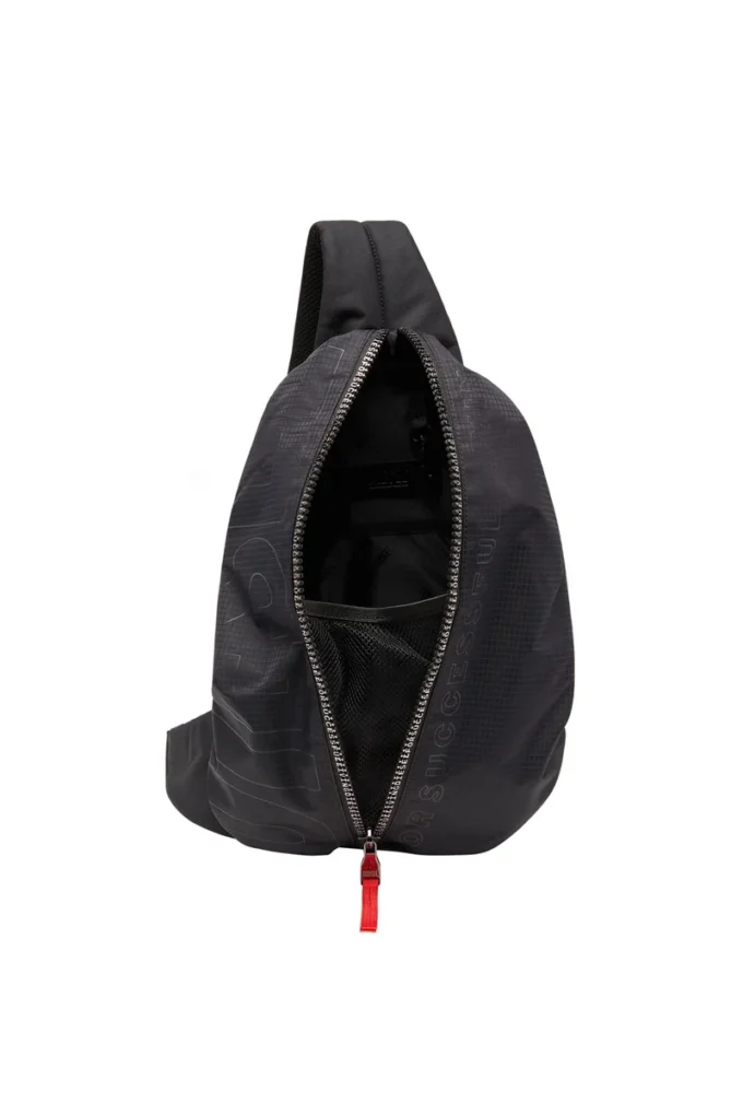 zip-d sling bag x Zip-D-Sling ryggsäck i rutig jacquardtyg zip-d sling bag x Zip-D-Sling ryggsäck i rutig jacquardtyg