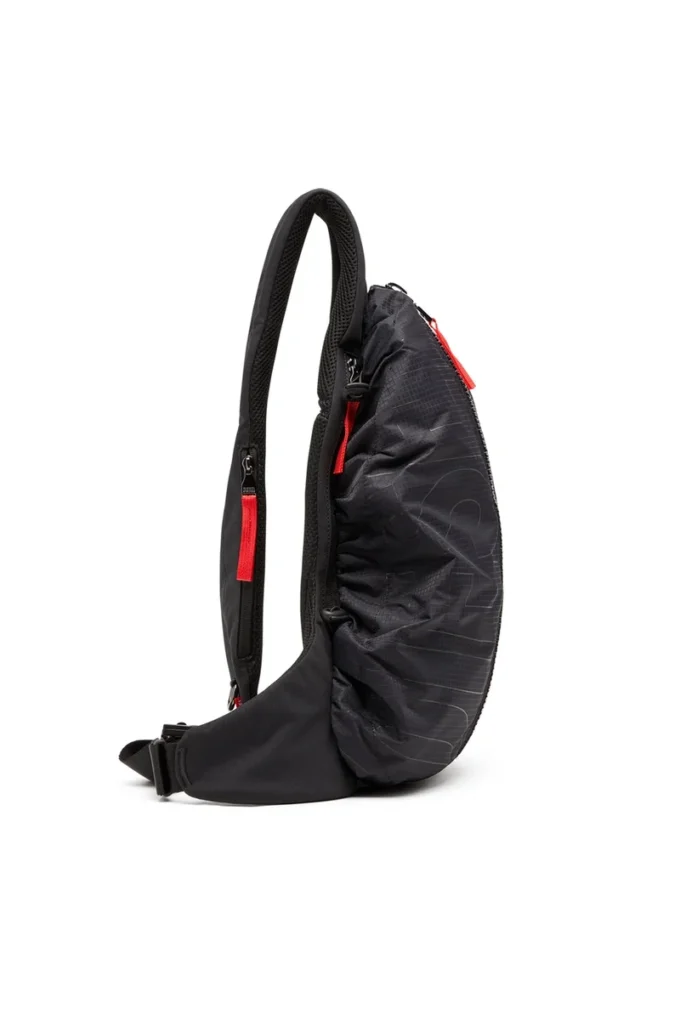 zip-d sling bag x Zip-D-Sling ryggsäck i rutig jacquardtyg zip-d sling bag x Zip-D-Sling ryggsäck i rutig jacquardtyg