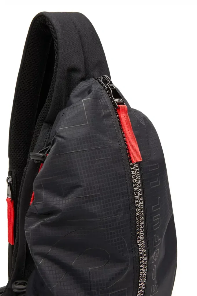 zip-d sling bag x Zip-D-Sling ryggsäck i rutig jacquardtyg zip-d sling bag x Zip-D-Sling ryggsäck i rutig jacquardtyg
